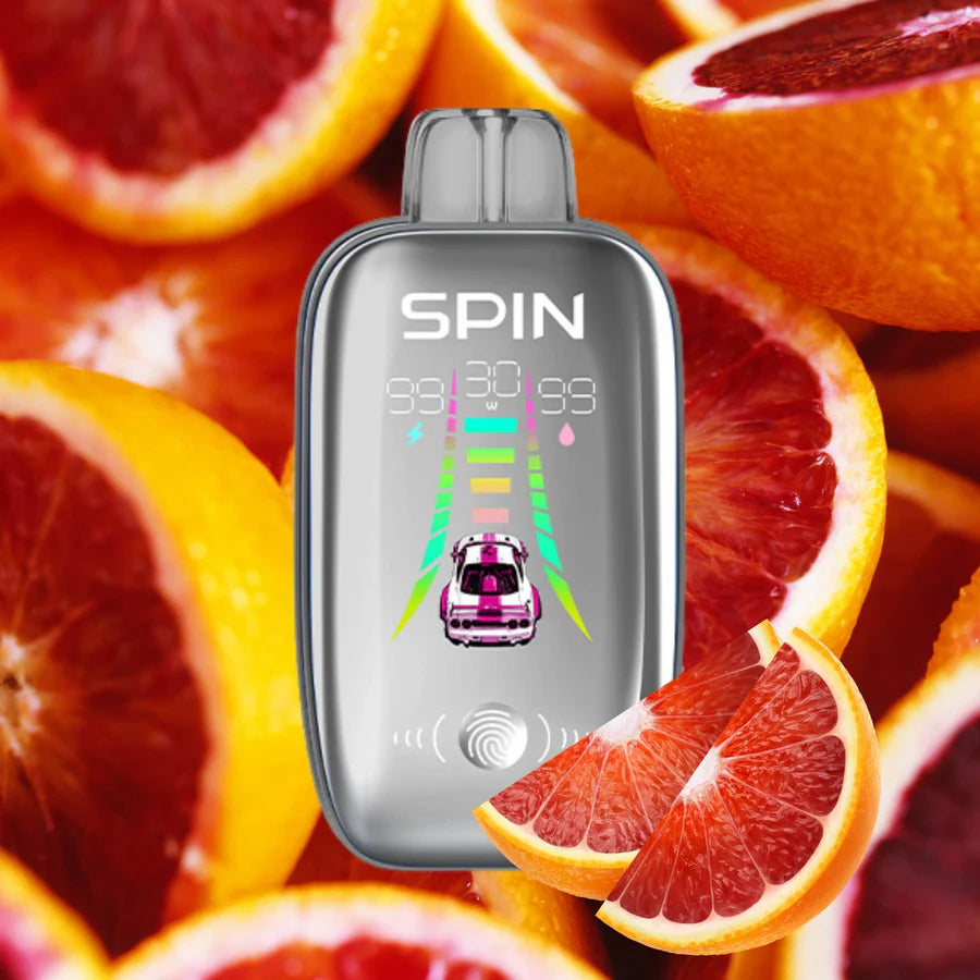 SPIN 40K Blood Orange device surrounded by fresh blood oranges and slices, featuring a vibrant digital display.